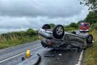 Police issue aquaplane warning after car flips over on wet road